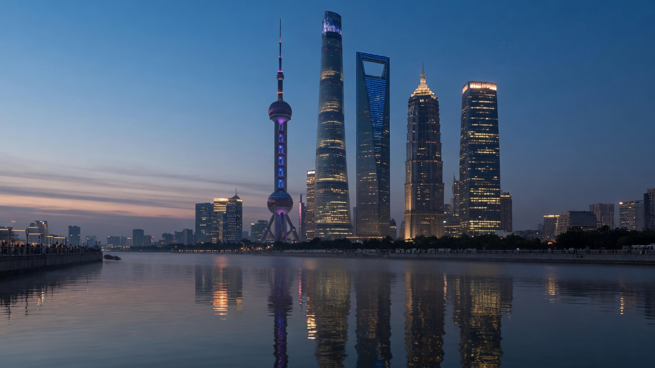 The Shanghai Bund at dusk, with the Pudong skyline reflected in the Huangpu river
