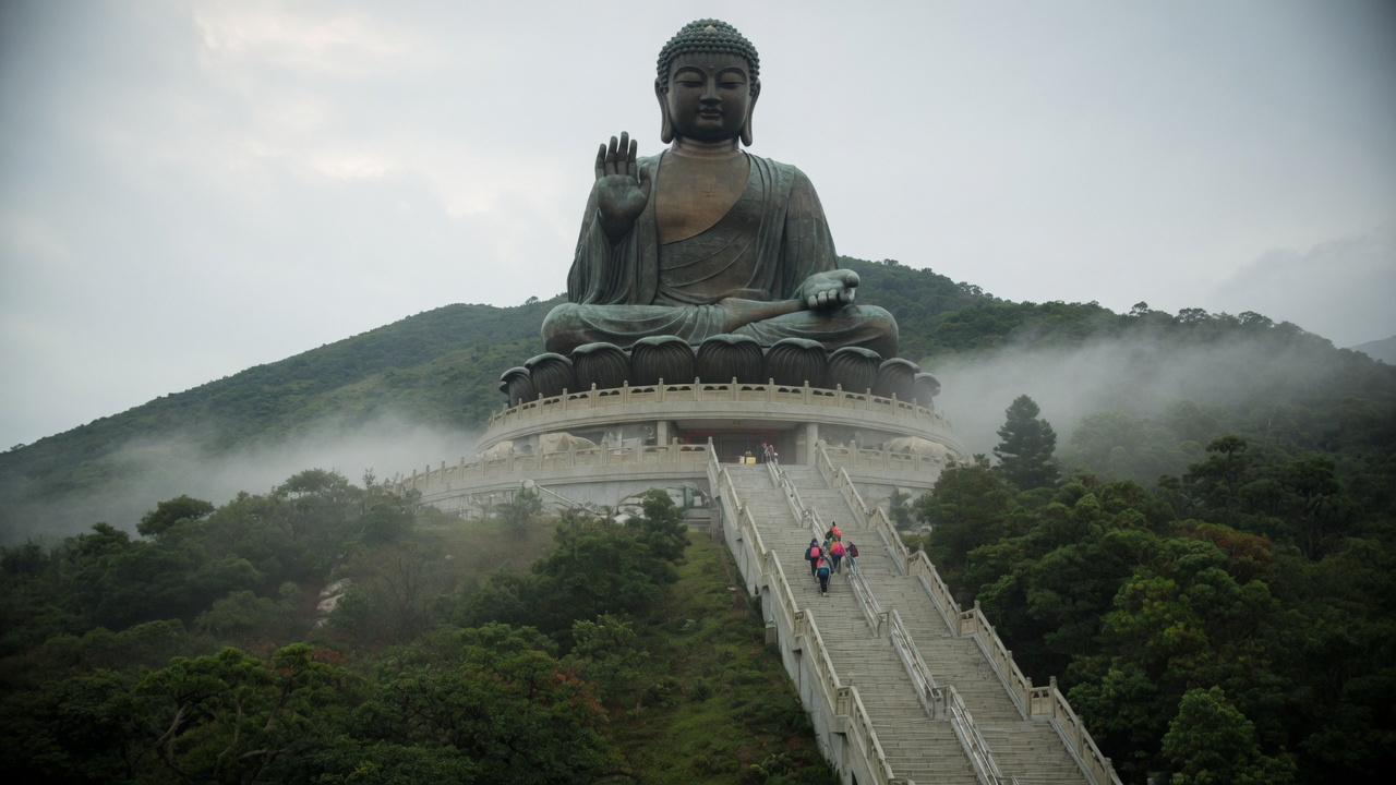 The bronze Tian Tan Buddha statue seated atop the Ngong Ping plateau on Lantau Island, Hong Kong